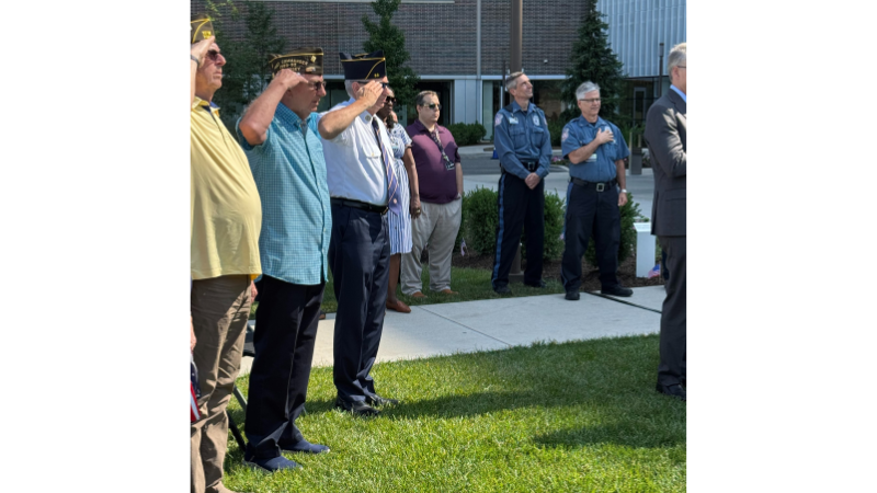veteran's saluting the flag during the national anthem