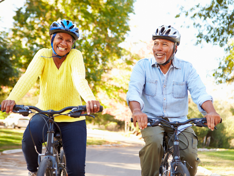 Man and woman on bikes